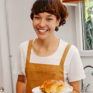 Woman holding pastry